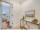 Hallway with decorative console table and artwork at 235 Cooper River Dr, Mount Pleasant, SC 29464