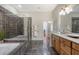 Modern bathroom with double vanity, granite countertops, and large walk-in shower at 235 Cooper River Dr, Mount Pleasant, SC 29464