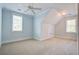 Light blue bedroom with carpet and two windows at 1999 N Creek Dr, Mount Pleasant, SC 29466