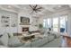 Spacious living room with built-ins, fireplace, and hardwood floors at 1999 N Creek Dr, Mount Pleasant, SC 29466