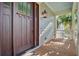 Inviting front porch with stylish wood door at 1999 N Creek Dr, Mount Pleasant, SC 29466