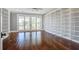 Spacious library featuring built-in shelving and hardwood floors at 1999 N Creek Dr, Mount Pleasant, SC 29466