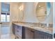 Bathroom with granite countertops, double sinks, and oval mirrors at 1999 N Creek Dr, Mount Pleasant, SC 29466