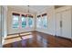 Bright dining room with hardwood floors and large windows at 1999 N Creek Dr, Mount Pleasant, SC 29466
