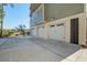 Spacious concrete driveway leading to a three-car garage at 1999 N Creek Dr, Mount Pleasant, SC 29466