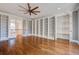 Spacious library with hardwood floors, built-in shelves and ample storage at 1999 N Creek Dr, Mount Pleasant, SC 29466