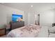 Spacious bedroom with dresser, large TV, and ensuite bathroom access at 728 Ladywood Dr, Summerville, SC 29486