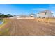 Backyard with pond and wooden fence at 728 Ladywood Dr, Summerville, SC 29486