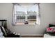 Window view overlooking a peaceful lake at 728 Ladywood Dr, Summerville, SC 29486