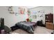 Cozy bedroom with double bed, dresser, and large window at 728 Ladywood Dr, Summerville, SC 29486