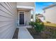 Front door entrance with small porch and landscaping at 728 Ladywood Dr, Summerville, SC 29486
