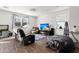 Living room with hardwood floors, comfy seating and a large TV at 728 Ladywood Dr, Summerville, SC 29486