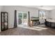 Living room with sliding glass doors leading to backyard at 728 Ladywood Dr, Summerville, SC 29486