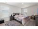 Main bedroom with plush carpet, large bed, and plenty of natural light at 728 Ladywood Dr, Summerville, SC 29486