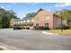 Brick building exterior with parking and landscaping at 2150 Spoleto Ln # H7, North Charleston, SC 29406