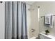 Clean bathroom with shower/tub combo, gray accents, and modern fixtures at 2150 Spoleto Ln # H7, North Charleston, SC 29406