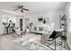 Modern living room with light walls and comfortable seating at 2150 Spoleto Ln # H7, North Charleston, SC 29406