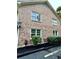 Brick building exterior with landscaping and windows at 2150 Spoleto Ln # H7, North Charleston, SC 29406