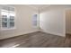 Spacious bedroom with neutral walls and hardwood floors at 321 Trailmore Ln, Summerville, SC 29486