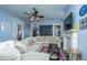 Spacious living room with sectional sofa, coffee table, and ceiling fan at 64 Radcliffe St, Charleston, SC 29403