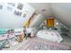 Spacious attic bedroom with ample natural light at 64 Radcliffe St, Charleston, SC 29403