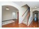 Hardwood floor entryway with staircase and archways leading to other rooms at 551 Rosings Dr, Summerville, SC 29486