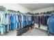 Well-organized walk-in closet with hanging rods and shoe storage at 551 Rosings Dr, Summerville, SC 29486