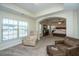 Relaxing sitting area with comfortable armchairs and views of the backyard at 551 Rosings Dr, Summerville, SC 29486