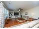 Spacious living room with hardwood floors, built-in shelving, and comfortable seating at 551 Rosings Dr, Summerville, SC 29486