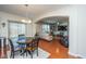 Bright dining area with a charming round table and four chairs, overlooking the living room at 551 Rosings Dr, Summerville, SC 29486