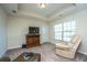 Bright bonus room with large windows and ceiling fan at 551 Rosings Dr, Summerville, SC 29486