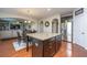 Kitchen features granite countertops, stainless steel refrigerator, and dark wood cabinets at 551 Rosings Dr, Summerville, SC 29486