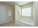 Clean bathroom with a shower and bathtub, and a window at 551 Rosings Dr, Summerville, SC 29486