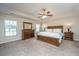 Spacious main bedroom with carpeted floor, large bed, and ample dresser space at 551 Rosings Dr, Summerville, SC 29486