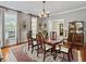 Elegant dining room features hardwood floors, a formal dining table, and a chandelier at 102 Flud St, Summerville, SC 29483