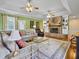 Spacious living room with hardwood floors, fireplace, and ample natural light at 102 Flud St, Summerville, SC 29483
