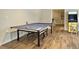 Game room with ping pong table and arcade game at 102 Flud St, Summerville, SC 29483