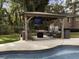 Outdoor gazebo with seating and TV near pool at 102 Flud St, Summerville, SC 29483