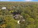 House nestled in a wooded area with a long driveway at 102 Flud St, Summerville, SC 29483