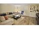 Finished basement with comfortable seating and a media cabinet at 102 Flud St, Summerville, SC 29483
