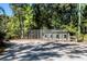 Spacious dog kennels with chain link fence, providing ample space for multiple dogs at 4239 Tom Point Rd, Hollywood, SC 29449