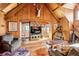 Spacious game room with wood-paneled walls and vaulted ceiling at 4239 Tom Point Rd, Hollywood, SC 29449