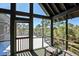 Screened porch with access to rooftop deck and marsh views at 4239 Tom Point Rd, Hollywood, SC 29449