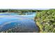 Picturesque waterfront view with a wooden pier at 4239 Tom Point Rd, Hollywood, SC 29449