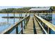 Wooden dock and floating dock system with a covered shelter at 4239 Tom Point Rd, Hollywood, SC 29449