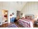 Charming bedroom with high ceilings, hardwood floors and en-suite bath at 4239 Tom Point Rd, Hollywood, SC 29449