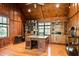 Spacious home office with built-in shelving and hardwood floors at 4239 Tom Point Rd, Hollywood, SC 29449