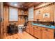 Room with wooden cabinets and fishing gear at 4239 Tom Point Rd, Hollywood, SC 29449