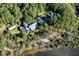 Estate property with multiple buildings and lush landscaping at 4239 Tom Point Rd, Hollywood, SC 29449