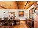 Elegant dining room featuring a large table and hardwood floors at 4239 Tom Point Rd, Hollywood, SC 29449